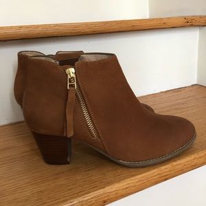 Heeled brown leather ankle boots